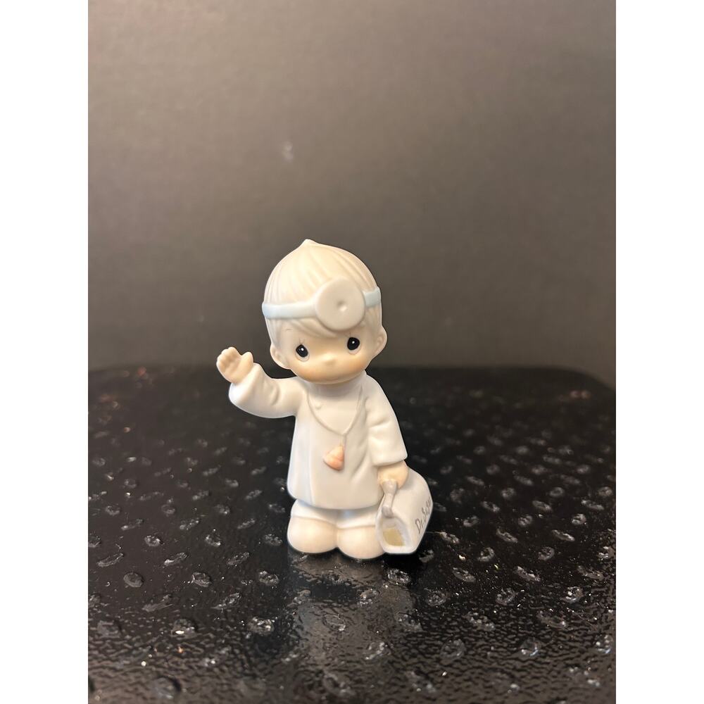 1994 Precious Moments "Dr. Sam Sugar" figurine from the Sugar Town Collection